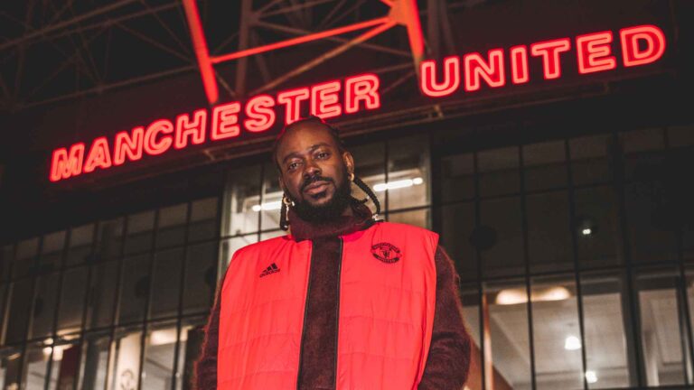 Adekunle Gold dazzles as a model for Manchester United’s clothing line