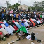 Christian Protesters Protect Muslim Counterparts During Prayers in Jos