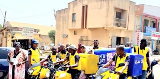 NIPOST Marks World Post Day With Road Walk, Awards Two Students